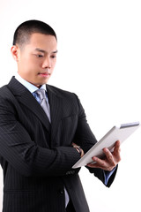 Businessman working on digital tablet