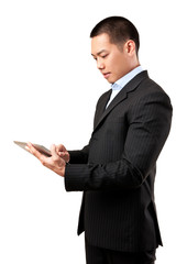 Businessman working on digital tablet