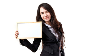 Naklejka premium Business woman holding a blank white board