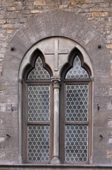 Old window on stone facade