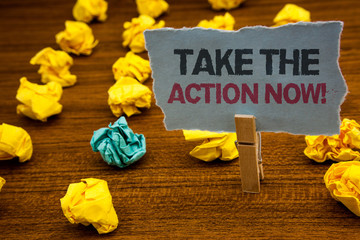 Fototapeta premium Writing note showing Take The Action Now Motivational Call. Business photo showcasing Act Start Promptly Immediate Instantly Cardboard with letters wooden floor fuzzy yellow lumps green hunch