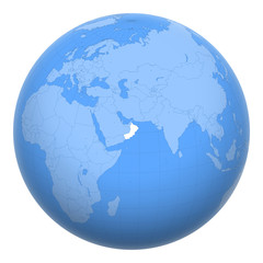 Oman on the globe. Earth centered at the location of the Sultanate of Oman. Map of Oman. Includes layer with capital cities.