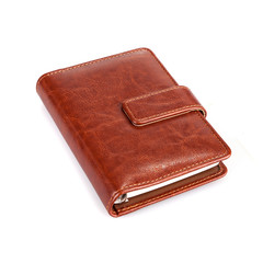 Brown leather notebook on a white background