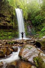 Unidentified Woman Standing at Mahua Waterfall in Crocker Range National Park Tambunan Sabah Borneo...