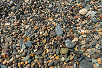 sfondo spiaggia mare ciottoli colorati