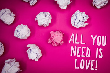Conceptual hand writing showing All You Need Is Love Motivational. Business photo text Deep affection needs appreciation romance Ideas pink background crumpled papers trial mistakes several tries
