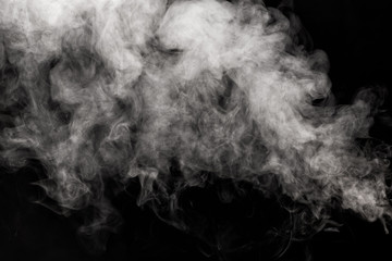 Movement of smoke on black background.