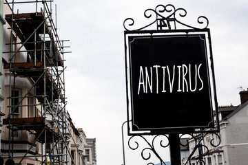 Obraz premium Word writing text Antivirus. Business concept for Safekeeping Barrier Firewall Security Defense Protection Surety Vintage black board sky old city vintage antique ideas message scaffolding