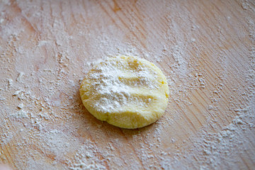 preparation of a dough for baking on a chopping board