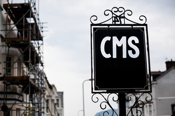 Writing note showing Cms. Business photo showcasing Content Management System supports modification...