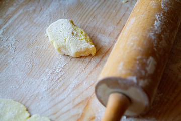 preparation of a dough for baking on a chopping board