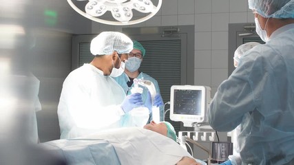 Operation room surgery in hospital. Professional treatment concept.