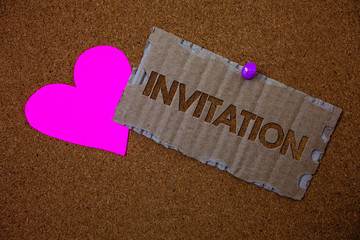 Conceptual hand writing showing Invitation. Business photo text Written or verbal request someone to go somewhere or do something Brown old damaged paperboard ideas pink heart cork background
