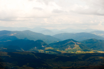 Obraz premium Mountain landscape with beautiful clouds before the rain. Location place Ukraine Carpathian meadow Borzhava.