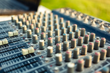 Close up of audio mixer. Soft focus.