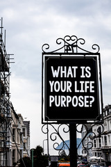 Handwriting text writing What Is Your Life Purpose Question. Concept meaning Personal Determination Aims Achieve Goal Vintage black board white letters words cloudy background old city ideas
