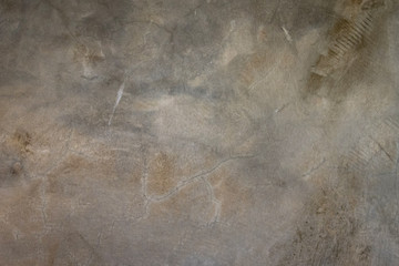 Gray wall of exposed concrete with strongly visible structure of modern loft style for texture and background.