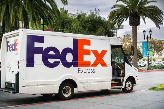 November 8, 2017 San Jose/CA/USA - FedEx Express van making deliveries in Santana Row, San Francisco bay