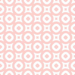 Fototapeta premium Seamless pattern in light pink and white colors. Abstract geometric background