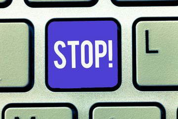 Text sign showing Stop. Conceptual photo Come to an end Prevent Take action to an event from...