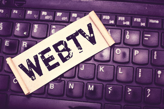 Writing note showing Webtv. Business photo showcasing Internet transmission programs produced both online and traditional.