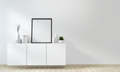 Mock up poster idea of cabinet white on wall and floor wooden room modern zen style.3D rendering