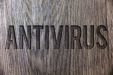 Conceptual hand writing showing Antivirus. Business photo showcasing Safekeeping Barrier Firewall Security Defense Protection Surety Wooden background vintage wood board message ideas feelings