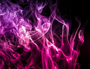 Obraz na płótnie Canvas Colored smoke on black background