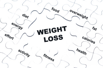 Weight loss white puzzle pieces assembled