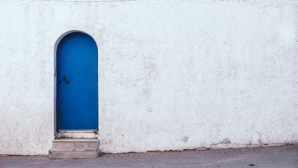 Obraz na płótnie Canvas Hammamet Medina streets with blue walls. Tunis, north Africa