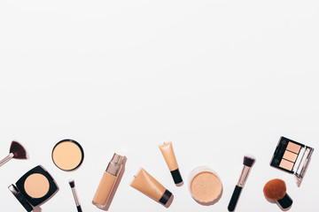 Flat lay arrangement bottom row of cosmetic products