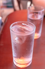 Glass water drink cool with tube on table