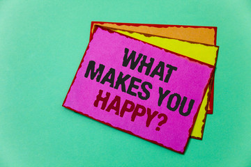 Writing note showing What Makes You Happy Question. Business photo showcasing Happiness comes with love and positive life Ideas message communicate feelings thought reflection green background