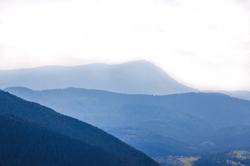 Blue mountains at different distances in perspective_
