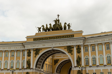 Fototapeta na wymiar Decorated facade Triumphal arch of the General Staff Building in St. Petersburg, Russia in overcast day. View from the Palace Square. Built in 1819-1829.