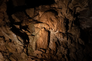 Underground caverns illuminated to show unique formations