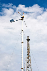 Windmill with a cloudy sky