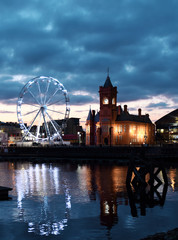 Pier head building and ferris building located in Mermaid Quay of Cardiff Bay - Cardiff, Wales,...