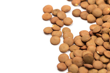 Pile lentil isolated on white background. Top view.