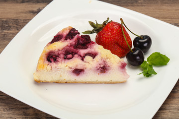 Cheesecake with cherry served strawberry