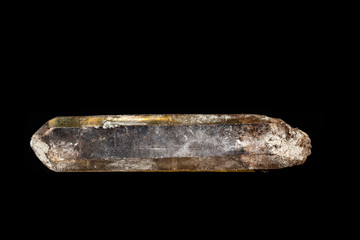 Macro mineral stone smoky quartz, rauchtopaz on a black background