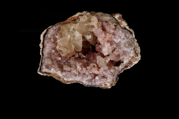 Macro mineral stone Pink Amethyst on a black background