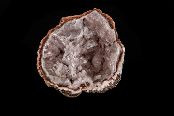 Macro mineral stone Pink Amethyst on a black background