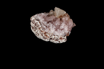 Macro mineral stone Pink Amethyst on a black background