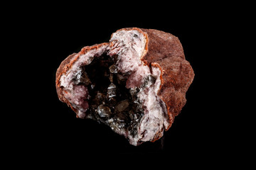 Macro mineral stone Pink Amethyst on a black background