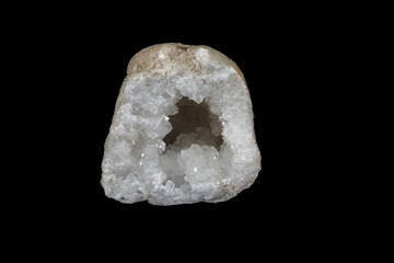Macro mineral stone Quartz geode black background