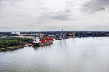 Naklejka premium Aeial drone photography of a logistics/cargo shipyard. Swinoujscie, Poland. 