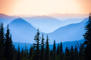 Hazy scenic view of mountain ranges in Mt. Rainier National Park.