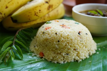 Rava Upma/ Uppuma -Popular South Indian breakfast with semolina serve in banana leaf