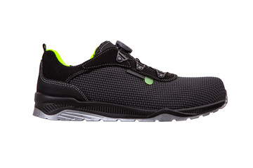 Modern black sneakers with green accents. Sports shoes isolate on a white background.